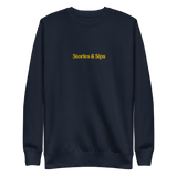 Stories & Sips Embroidered Unisex Premium Sweatshirt (Gold Threading)
